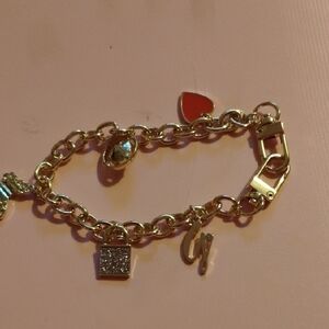 G by Guess Gold and Red Charm Bracelet